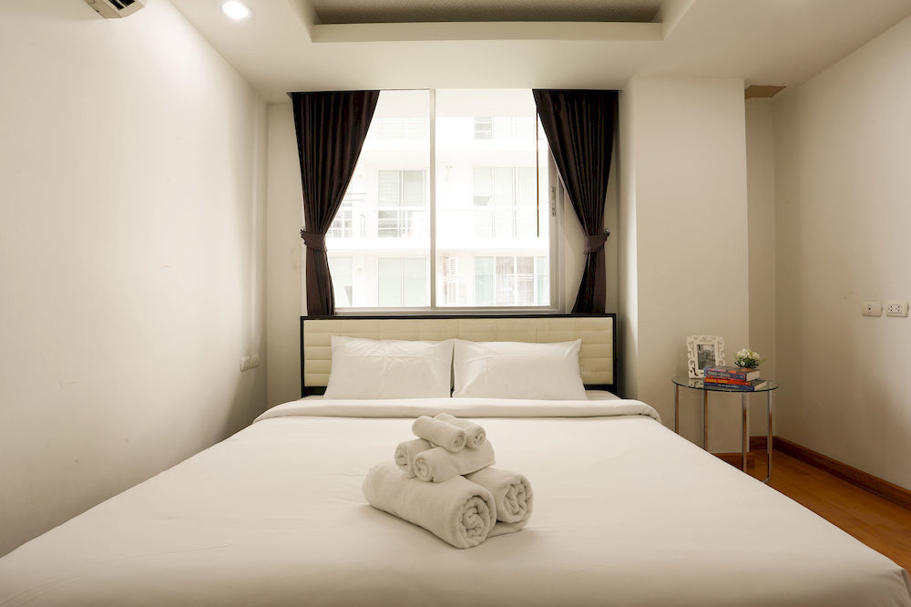 The Capital Resort @ Sukhumvit 50 Bangkok Exterior foto A bedroom at a hotel